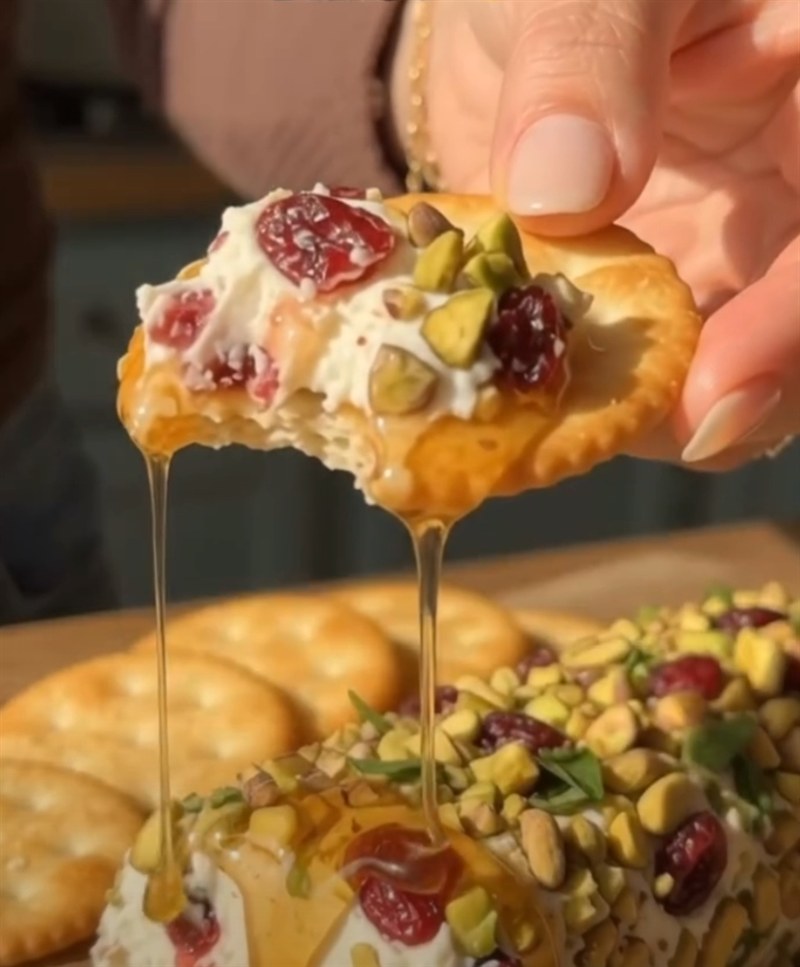 Boursin Cheese Log with Pistachios, Cranberries, Pecans and Honey